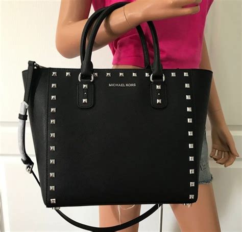 black michael kors purse with silver studs|Michael Kors black shoulder handbags.